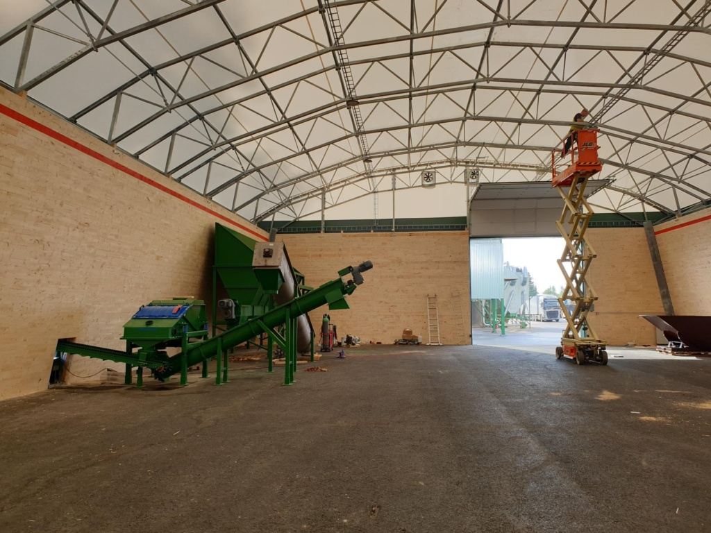 Conveyor passage in bulk storage PVC hall